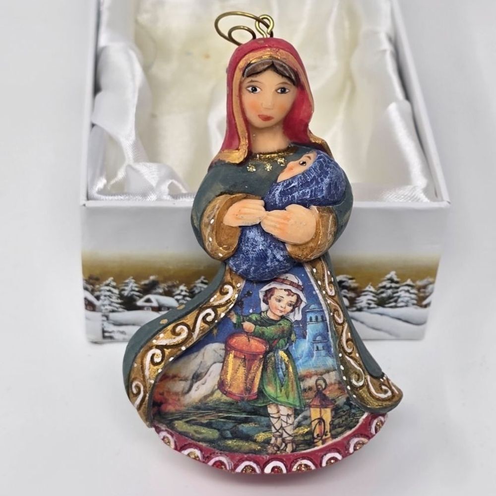 Handcrafted Holiday Figurine with Red and Blue Accents
